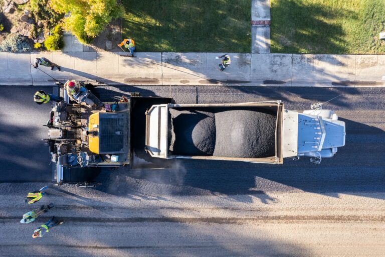 Photo by Michael Chacon a dump truck with a load of dirt in the back
